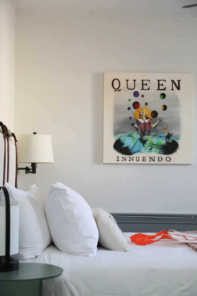 Guest room with poster above the bed